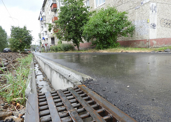 На улице Карпинского заменят лотки для отвода воды